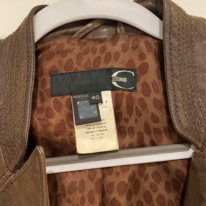 Size 40 usually runs as size small. Perfect condition designer collection.